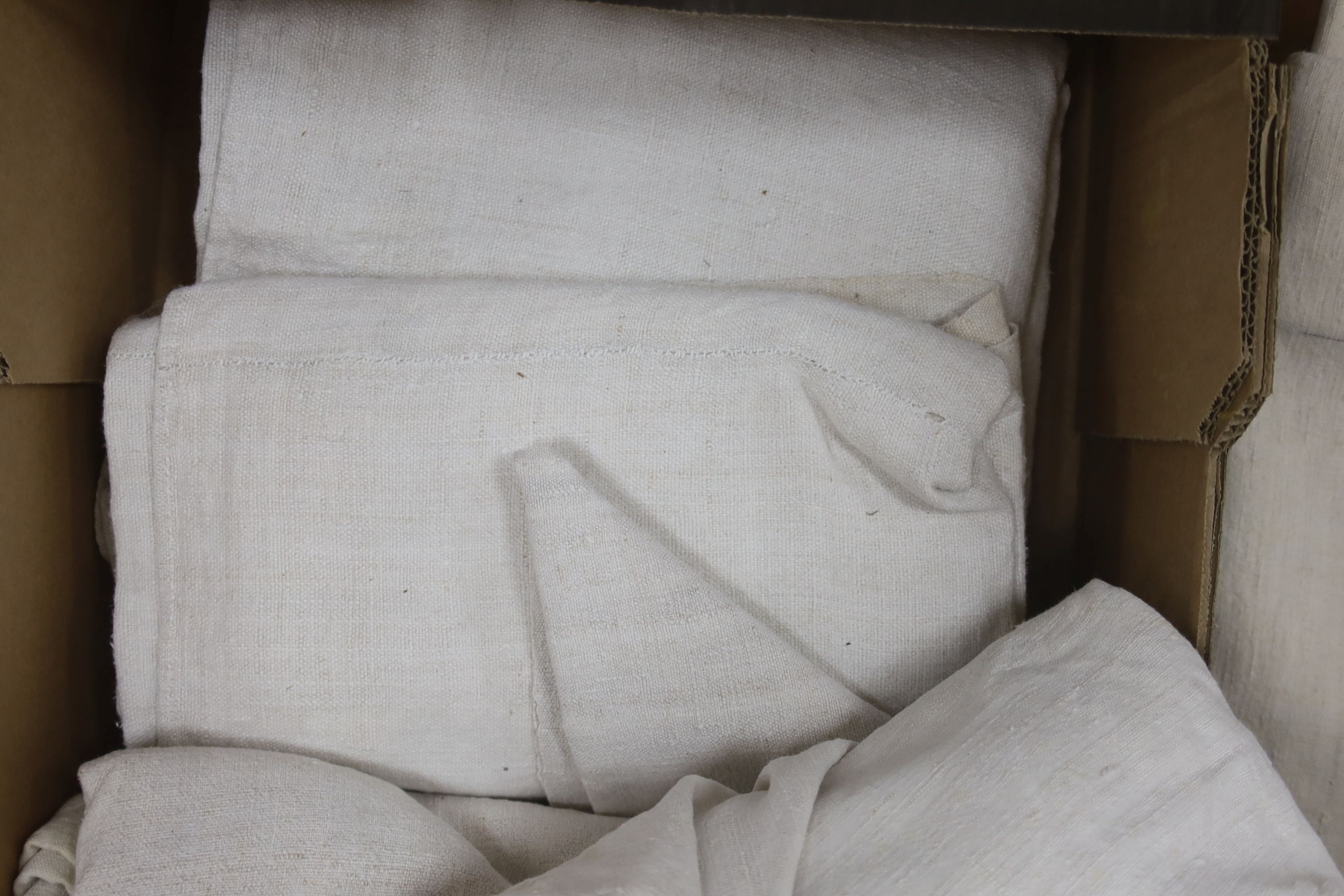 A collection of coarse French provincial linen sheets